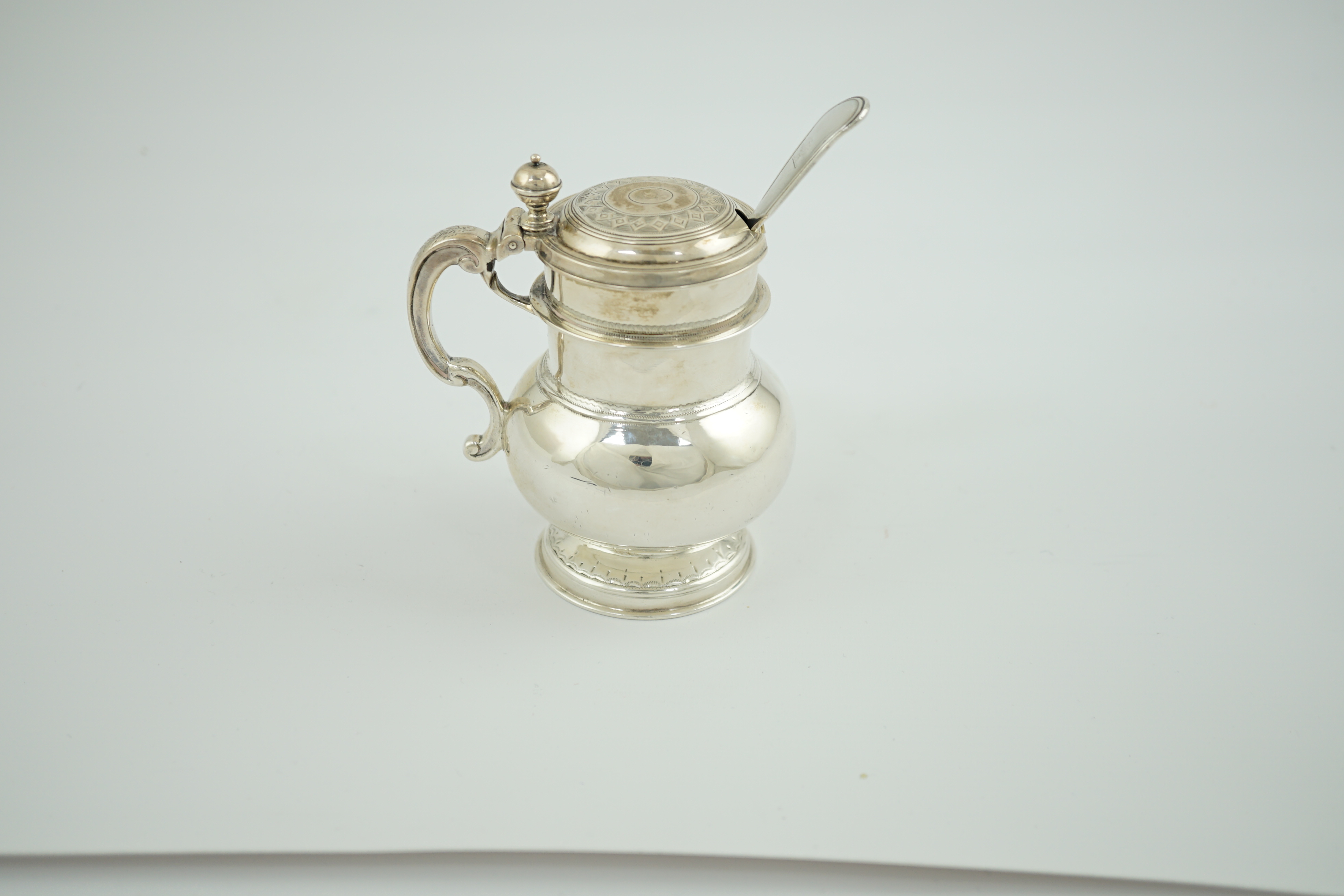 A Victorian silver bulbous mustard pot by Charles Thomas Fox & George Fox